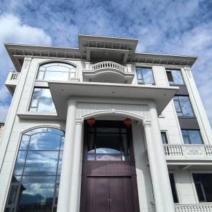 宜春白麻别墅外墙干挂石材效果示例