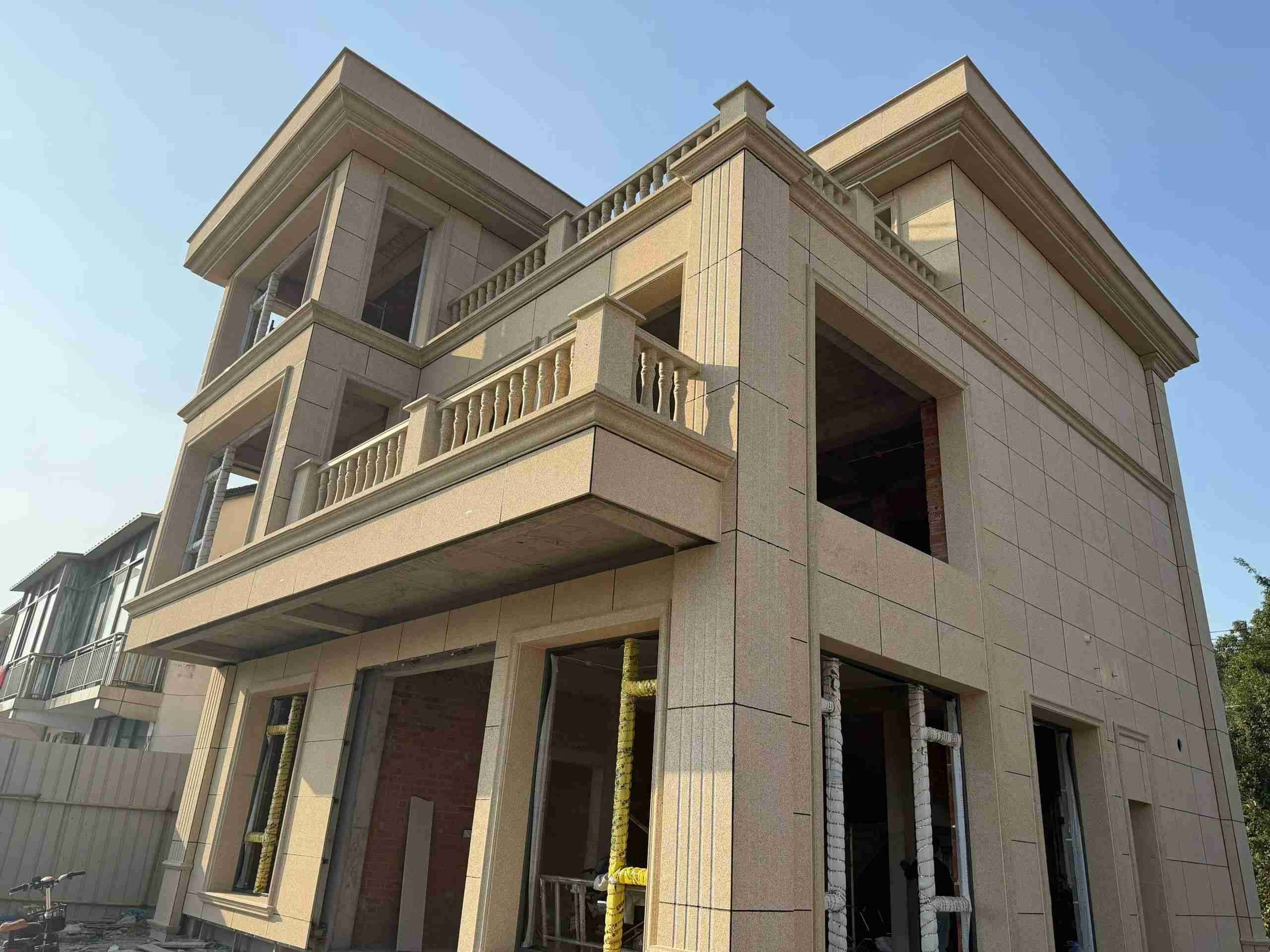 宜春 黄金麻花岗岩石材荔枝面外墙干挂效果展示